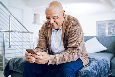 Buy stock photo Old man on bed with phone, smile and typing message, communication and technology in retirement. Social media, internet and cellphone, happy senior person in bedroom reading email or chat online.