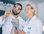 Tablet, science and a team planning while writing writing on glass in the laboratory for research or innovation. Healthcare, medical and scientist doctors working together in a lab for future study