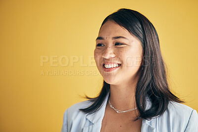 Buy stock photo Thinking, smile and Asian woman in creative business studio isolated on a yellow background mockup space. Vision, happy and designer, entrepreneur and employee worker planning startup idea in office