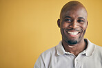 Face, smile and black man, designer and entrepreneur in studio isolated on a yellow background mockup space. Portrait, happy and creative African professional, worker and employee in startup company