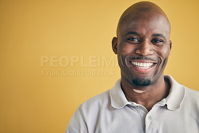 Buy stock photo Face, smile and black man, designer and entrepreneur in studio isolated on a yellow background mockup space. Portrait, happy and creative African professional, worker and employee in startup company