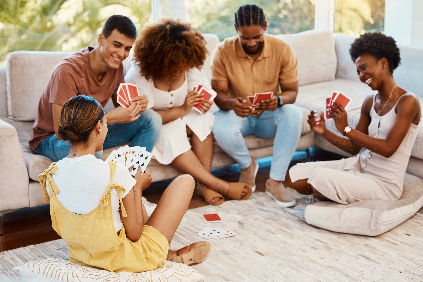 Buy stock photo Game, happy or friends playing cards, poker or black jack at home for gambling together in a holiday party. Smile, men or group of women laughing to relax in living room in a fun match competition