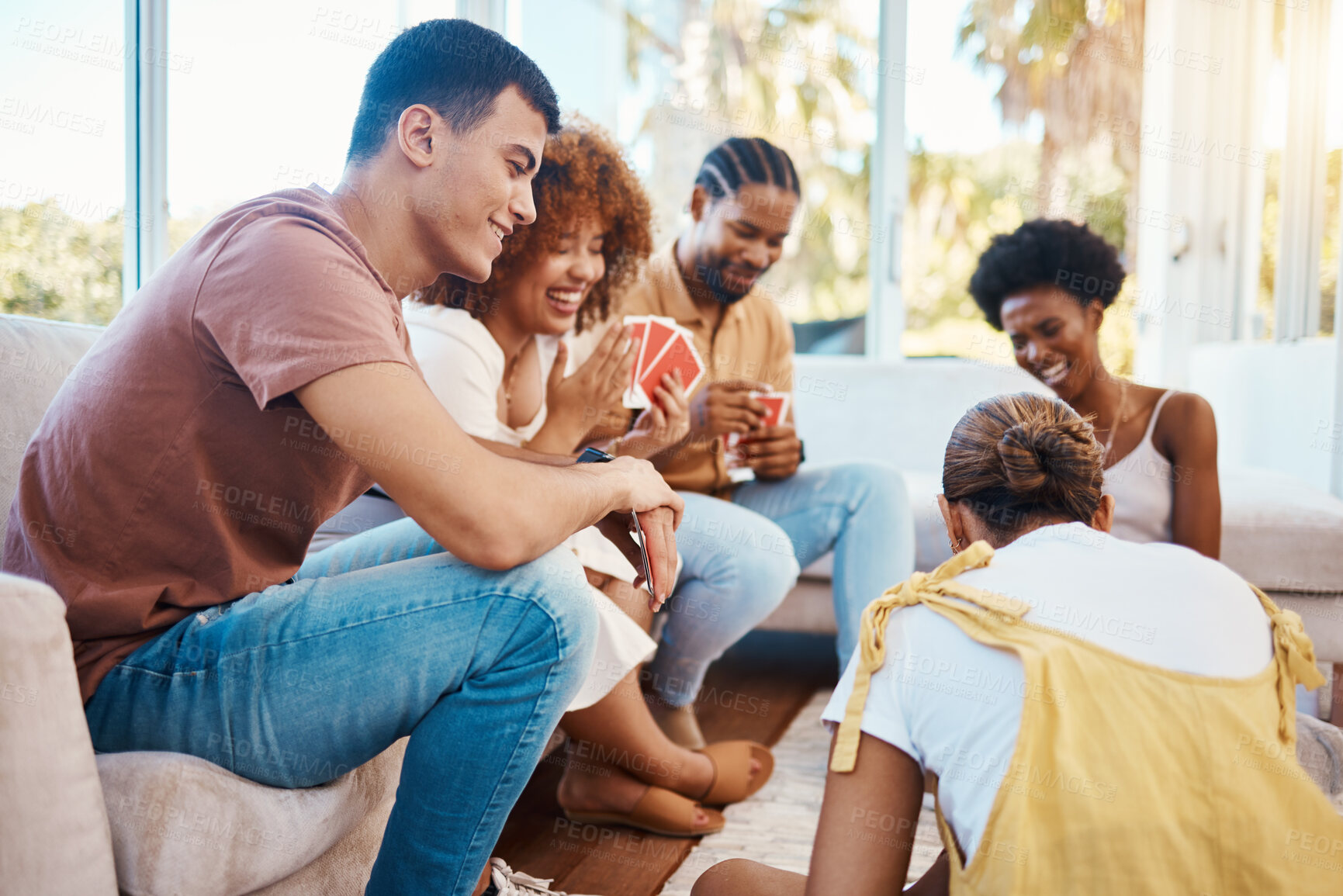 Buy stock photo Home, happy people or friends playing cards, poker or gambling in black jack to relax together in a party. Smile, men or group of women laughing in living room in a fun match or game on holiday 