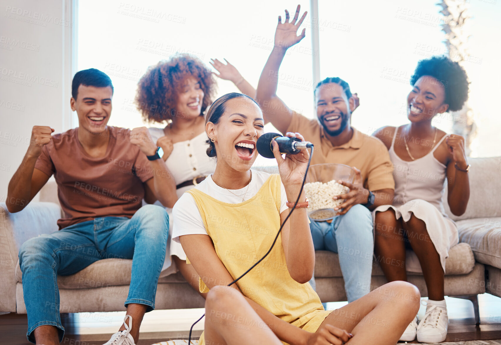 Buy stock photo Microphone, happy people or friends singing in home living room together in a party on holiday vacation break. Girl singer, men or group of funny women laughing in a fun karaoke celebration or game