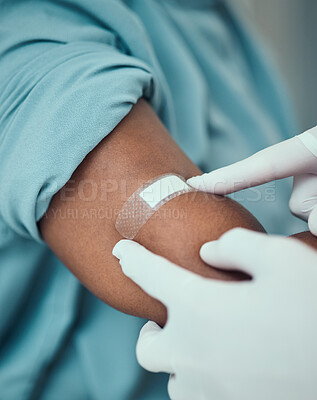 Buy stock photo Plaster, vaccine and hands of doctor with patient with bandage for flu shot, injection and immunity. Healthcare, hospital and closeup of arm of person for medicine, vaccination and virus protection