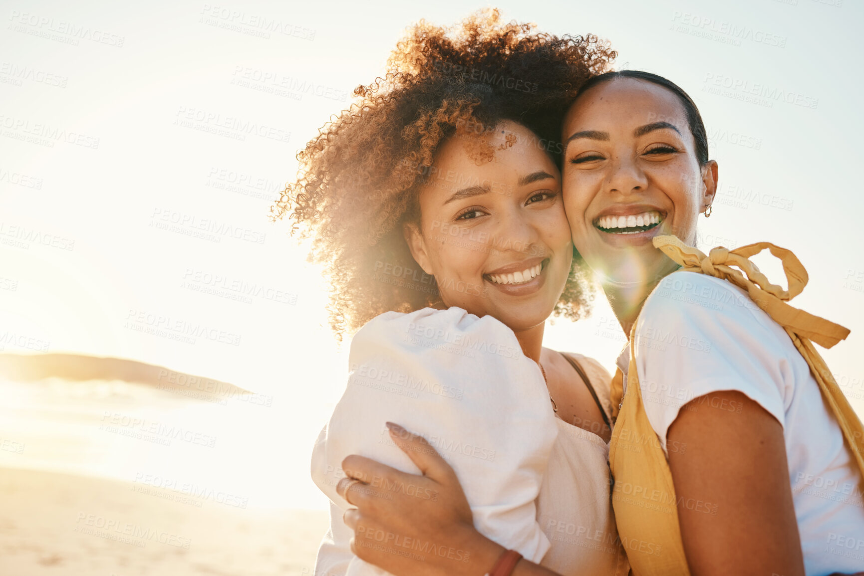 Buy stock photo Portrait, sunset and a gay couple hugging on the beach together for romance or bonding on a date. Face, love and a gay woman with her lesbian girlfriend by the sea or ocean on nature mockup space