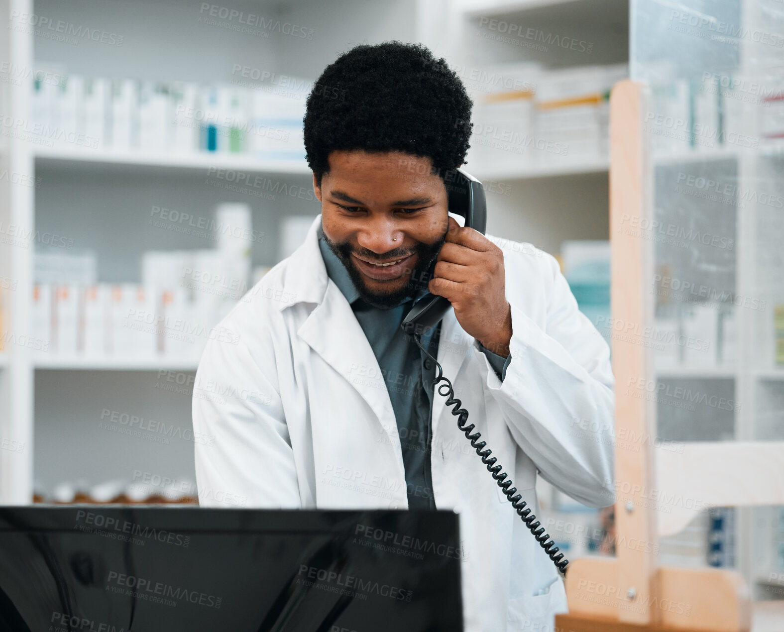 Buy stock photo Phone call, pharmacy and black man on computer for medicine, prescription and medication service. Healthcare, medical care and African pharmacist speaking for telehealth, consultation and online