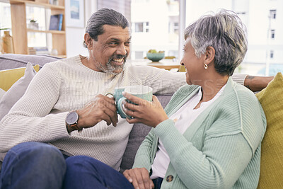 Buy stock photo Coffee, talking and mature couple on sofa for bonding, healthy relationship and connection. Marriage, love and happy man and woman drinking tea on couch to relax in discussion, conversation and chat