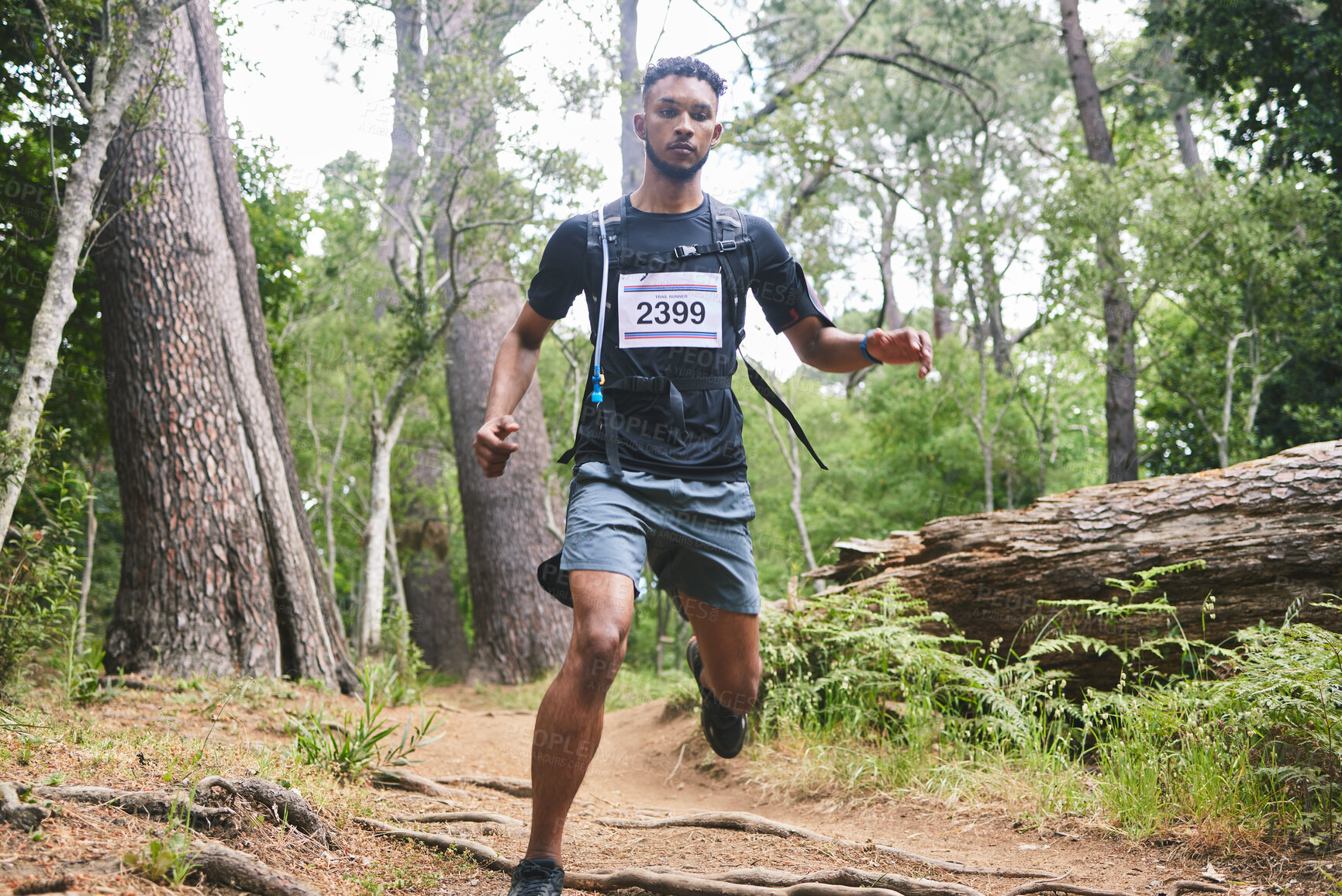 Buy stock photo Running, fitness and man in nature for exercise, marathon training and cardio workout. Sports, nature and athlete in woods for wellness, healthy body and endurance for race, challenge and competition