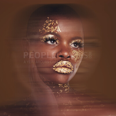 Buy stock photo Gold beauty, makeup and black woman with blur in studio with glitter cosmetics and sparkle art. Brown background, African female model and shine from paint and skin glow with golden luxury treatment