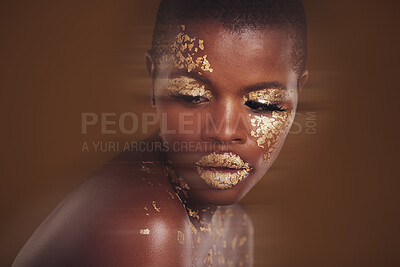 Buy stock photo Gold beauty, luxury makeup and black woman with blur in studio with glitter cosmetics and sparkle art. Brown background, African female model and shine from paint and skin glow with golden treatment