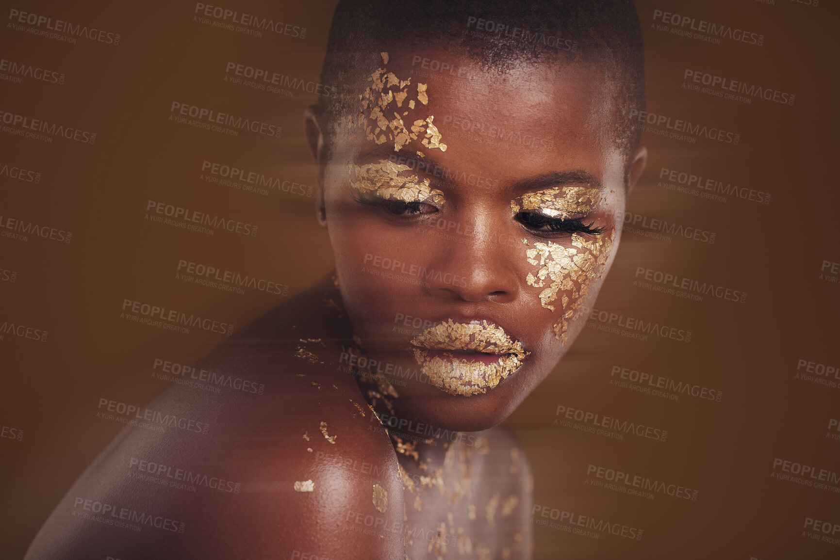 Buy stock photo Gold beauty, luxury makeup and black woman with blur in studio with glitter cosmetics and sparkle art. Brown background, African female model and shine from paint and skin glow with golden treatment