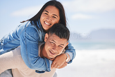 Buy stock photo Summer, piggyback and portrait of a couple at the beach for a date, love or vacation together. Mockup, smile and a man and woman with a hug at the sea for a holiday, travel or bonding in marriage