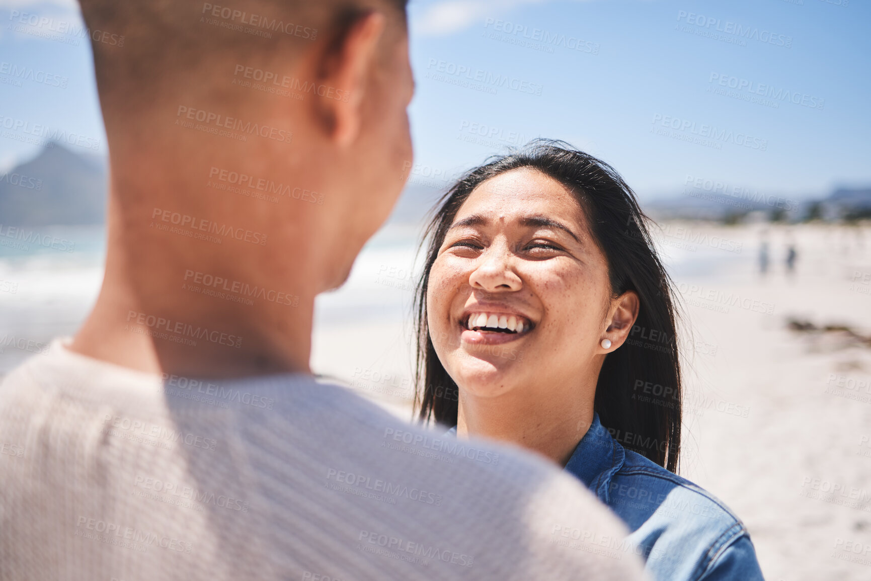 Buy stock photo Love, smile and summer with couple at beach for travel, honeymoon vacation and romance together. Happy, relax and bonding with man and woman walking on seaside holiday for care, date and trip