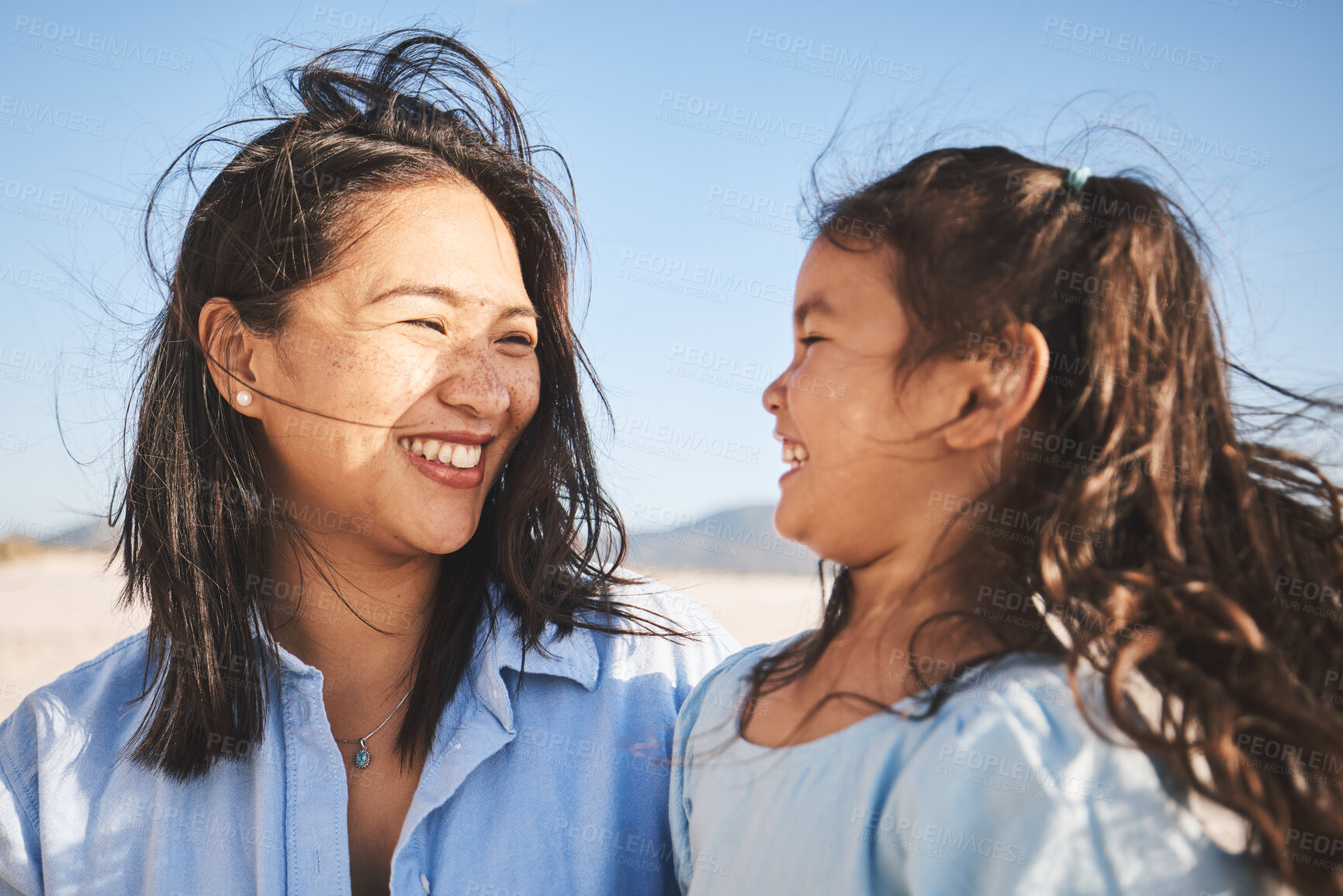 Buy stock photo Smile, love and a mother and child at the beach for family, travel or summer freedom. Happy, Bali and a mom with a girl kid at the ocean for a holiday, bonding or together with care at the sea