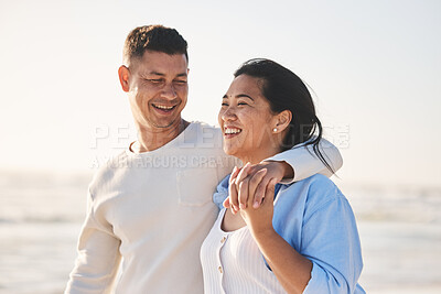 Buy stock photo Love, smile and hug with couple at beach for travel, summer vacation and romance together. Happy, relax and bonding with man and woman walking on seaside holiday for care, date and honeymoon