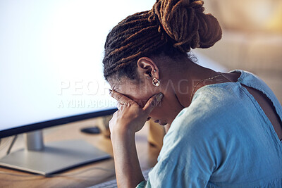Buy stock photo Business woman, tired and stress at computer in an office at night while working late on deadline. African entrepreneur person with hands on head for pain, burnout or depression and fatigue at work