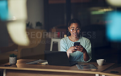 Buy stock photo Woman in dark office with phone, typing or reading email, message or social media post connectivity. Late night at work, cellphone and girl at desk networking, online chat or writing text at overtime