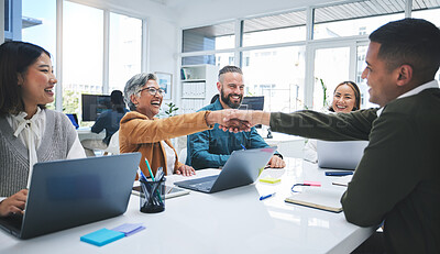 Buy stock photo Creative people, handshake and meeting in hiring, partnership or deal agreement together at the office. Group of employees shaking hands in recruiting, company growth or startup at the workplace