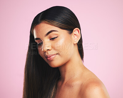 Buy stock photo Thinking, hair care and woman with cosmetics, growth and dermatology on a pink studio background. Ideas, person and female with volume, aesthetic or luxury with makeup, natural beauty or healthy skin
