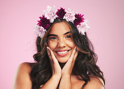 Buy stock photo Beauty, flowers and hair with portrait of woman in studio for cosmetics, skincare and wellness. Self care, spa treatment and crown with person on pink background for spring, glow and makeup 