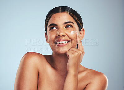 Buy stock photo Face, cosmetics cream and portrait of woman with aesthetic shine, dermatology and skincare makeup on studio background. Happy model thinking of facial sunscreen lotion for self care, beauty and glow 