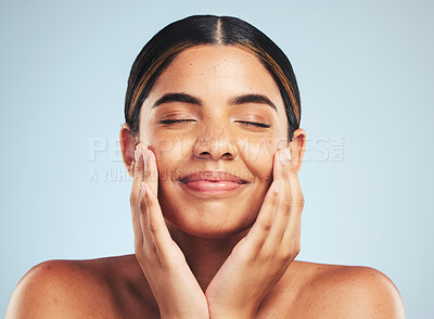 Buy stock photo Skincare, wellness and hand on face of woman in studio for cosmetology, cleaning and results on grey background. Happy, beauty and female model with cosmetic, treatment and self love satisfaction 