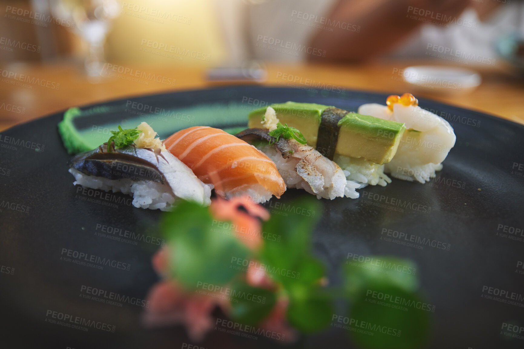 Buy stock photo Japanese, sushi and luxury food at a restaurant for dinner or lunch meal at a healthy Asian cafe on table. Plate, cuisine and fine dining takeaway or seafood from a Salmon menu for diet or nutrition