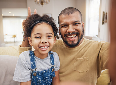 Buy stock photo Father, girl and selfie portrait in peace sign in home living room, bonding and laughing together. Dad, child and face smile in v hand on profile picture, happy memory or social media of funny family