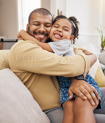 Buy stock photo Happy, love and girl hugging her father while relaxing on a sofa in the living room together. Smile, care and child bonding, embracing and sitting with her young dad in the lounge of their home.