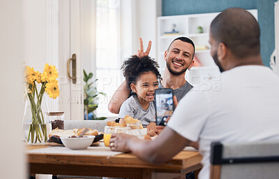 Buy stock photo Smartphone, lunch or photo of gay couple, kid and memory picture of happy family with peace sign, bunny ears gesture or pose. Cellphone, photography or child smile with bisexual, queer or relax dad