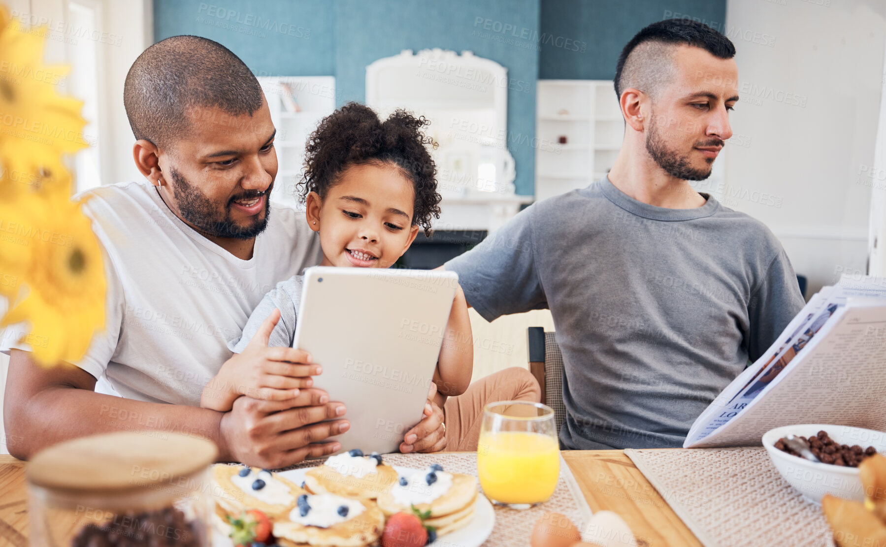 Buy stock photo Gay family, tablet and child with breakfast at home for e learning, bonding and education on internet. Adoption, lgbt men or parents with a happy kid and technology in morning with food on a table