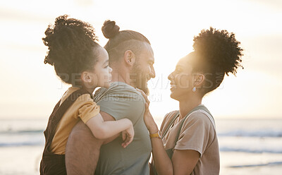 Buy stock photo Love, family and smile at beach at sunset, bonding and having fun together. Happy, mother and father of child at ocean in interracial care on summer holiday, vacation trip and travel outdoor at sea