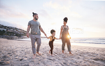 Buy stock photo Holding hands, family and walk on beach at sunset, bonding and mockup space. Father, mother and happy kid at ocean in interracial care, love or smile on vacation, holiday or summer travel together