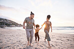 Family, holding hands and beach for travel, vacation and freedom, bond and fun in nature together. Love, swing and girl child with parents at the ocean playing, relax and walking on summer holiday
