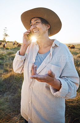 Buy stock photo Woman, farmer and phone call in morning, countryside and person on farm with smile for live stock in nature with connection. Happy, female worker and social network, communication and contact