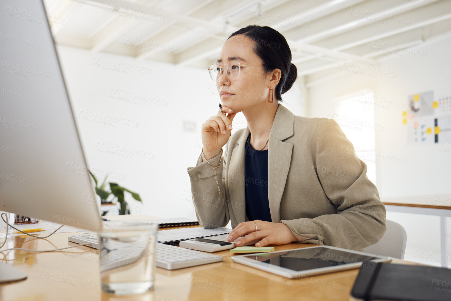 Buy stock photo Business woman, computer and thinking, planning or problem solving for marketing, website design or project. Professional asian person with focus, decision or choice on desktop for creative solution