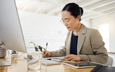 Buy stock photo Finance, budget and business woman writing in office for savings, tax or investment growth with calculator. Solution, planning and asian female financial advisor with sales, review and brainstorming