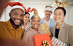 Business people, Christmas selfie and group with smile, present or portrait for celebration, diversity or party. Men, women and photography for xmas memory, friends and gift box for workplace culture