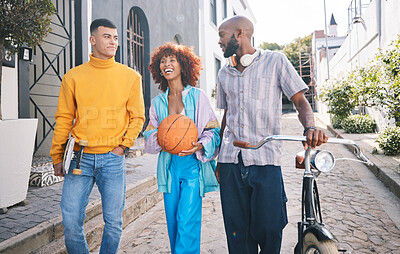 Buy stock photo Friends, city and people with a basketball and bicycle outdoor for travel, fashion and fun. Diversity, happiness and student group of men and woman laugh for adventure and freedom on urban street