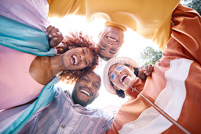 Buy stock photo Portrait, smile and a group of friends in a huddle outdoor together for freedom, bonding or fun from below. Diversity, travel or summer flare with happy men and women laughing outside on vacation