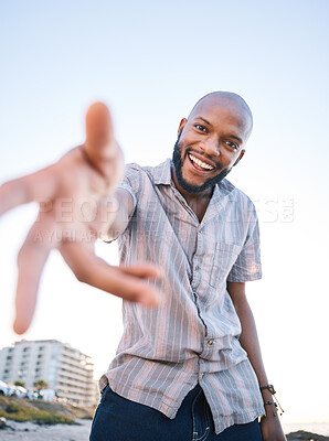 Buy stock photo Portrait, happy black man and helping hand, offer and invitation outdoor in low angle mockup. Smile, palm and African person giving assistance in support, care and acceptance of handshake to welcome