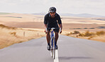 Portrait, street and man on a bike for travel, countryside cycling or training for a competition. Serious, fitness and a male cyclist with a bicycle in the road for a race, adventure or nature cardio