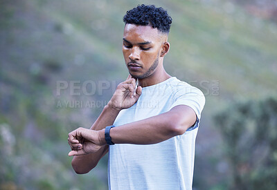 Buy stock photo Fitness, exercise and man with watch for pulse outdoor to check progress on run, workout or training. Indian athlete person or runner in nature for sports performance, cardio time and wellness app