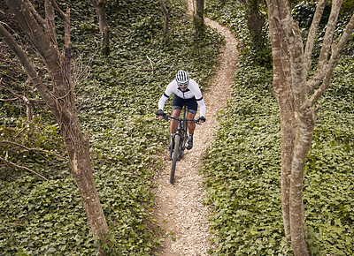 Buy stock photo Forest path, mountain bike and sports person travel, ride and adventure on nature trail, cycling challenge or bicycle journey. Top view, environment and athlete training, fitness and freedom in woods