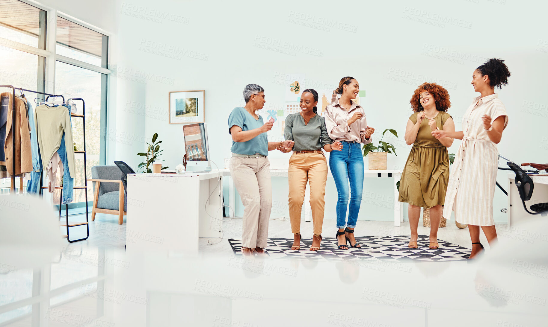 Buy stock photo Office, dancing or happy designers in celebration of fashion design victory or winning group achievement. Party, break or excited colleagues cheering for teamwork, goal target or bonus deal success