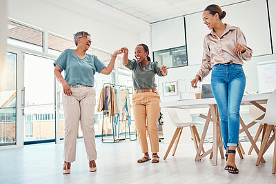Buy stock photo Women in creative office, dancing together and excited for achievement, success and small business sales goals. Celebration, diversity and happy employees at fun fashion design studio with smile.
