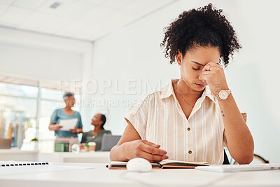 Buy stock photo Stress, headache and a business woman writing in her notebook while working to a deadline in the office. Anxiety, depression and compliance with a young fashion designer planning an artistic project