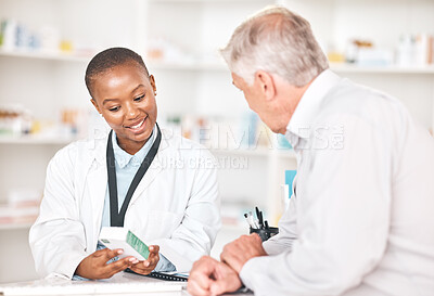 Buy stock photo Explain, medication and pharmacist with patient in pharmacy for medical assistance at dispensary. Discussion, medicine and black woman talking to a senior man at the counter of a pharmaceutical store