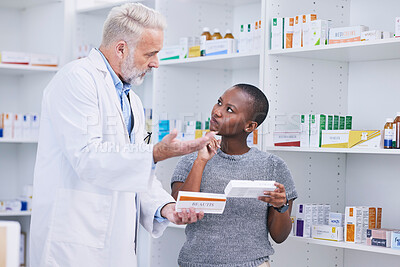 Buy stock photo Pharmacist, product choice and woman question healthcare worker on pills, medication or pharmaceutical. Pharmacy clinic, supplements and black person ask doctor recommendation on medicine decision